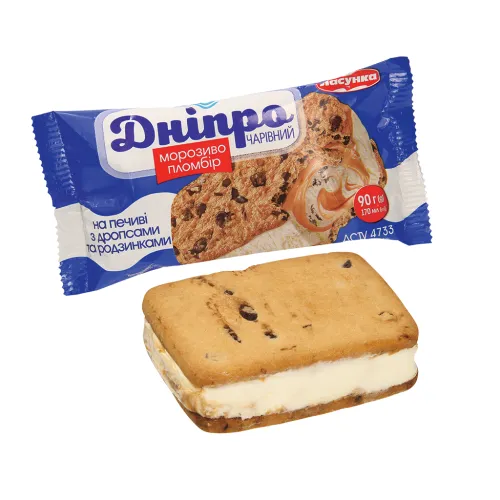 DNIPRO Charivnyi Eissandwich mit Vanillegeschmack,   einer Füllung mit Karamellgeschmack und kakaohaltigen Fettglasurstückchen 5%