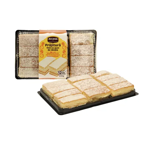 Biskuittörtchen mit 37,5% Creme mit Zitronengeschmack, bestreut mit Dekorpuder