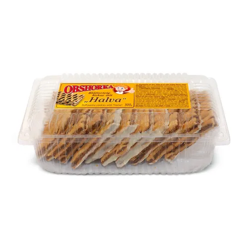 OBSHORKA Blätterteig Kekse mit Halva Füllung und mit weißer Fettglasur dekoriert
