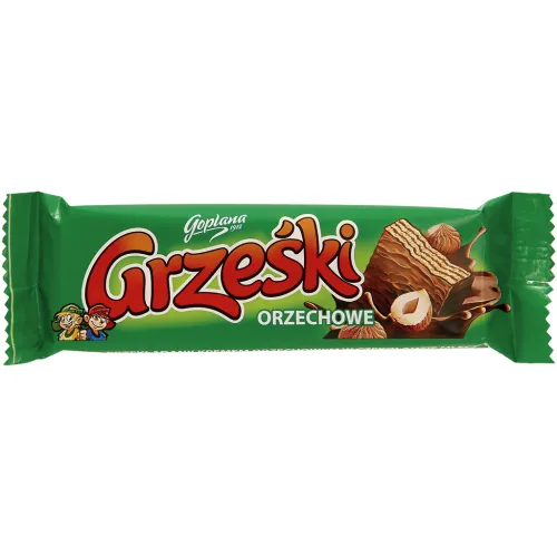 Grzeski orzechowe Waffel mit Haselnussgeschmack-Creme (48%) in Milchschokolade. Schokolade enthält neben Kakaobutter auch andere pflanzliche Fette.