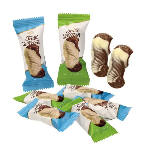 Frutti di Mare Hazelnut & Milk Pralinenmischung mit Cremefüllungen (57%) mit Haselnuss- und Milch-Geschmack.  Schokolade enthält neben Kakaobutter auch andere pflanzliche Fette.